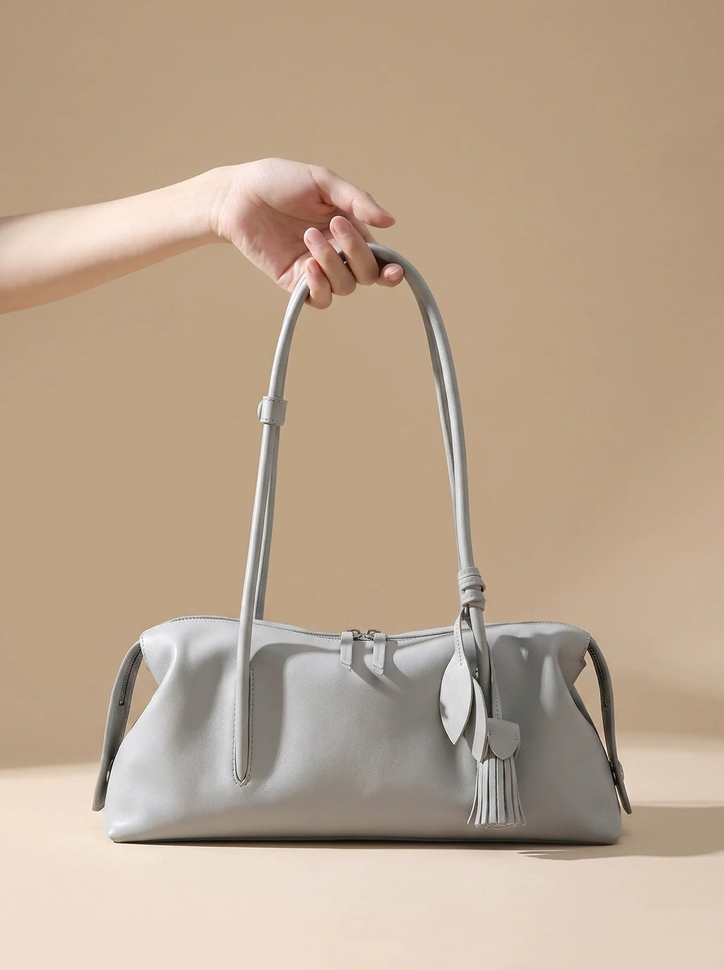 Dove Grey Soft Leather Pillow Shoulder Bag with Tassel Charm